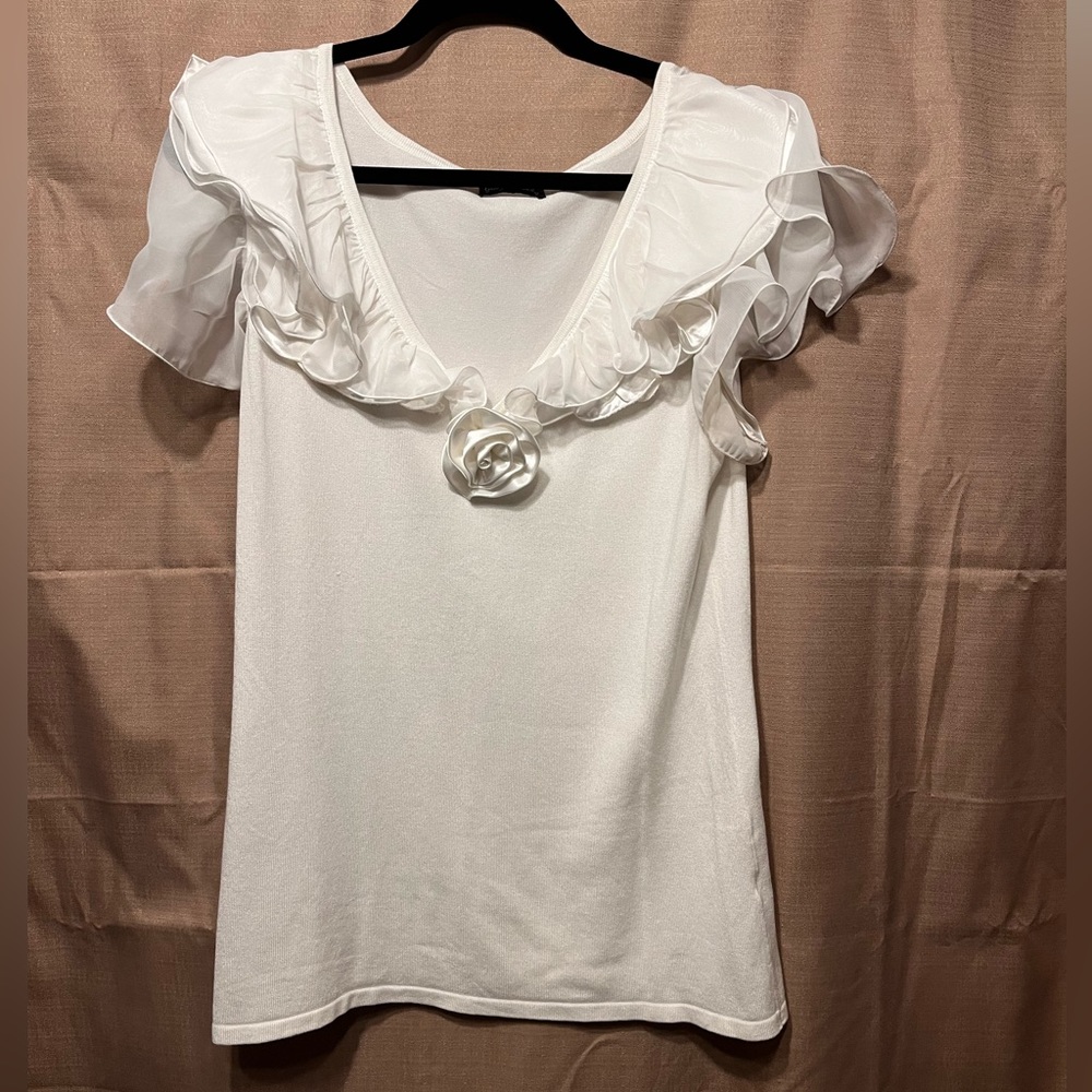 White sweater, v-neck with white rose detail, flutter cap sleeve. Ladies’ Large